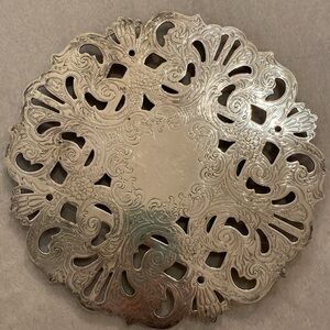 Ornate silver-plate vintage trivet 9.5 inches in diameter EUC